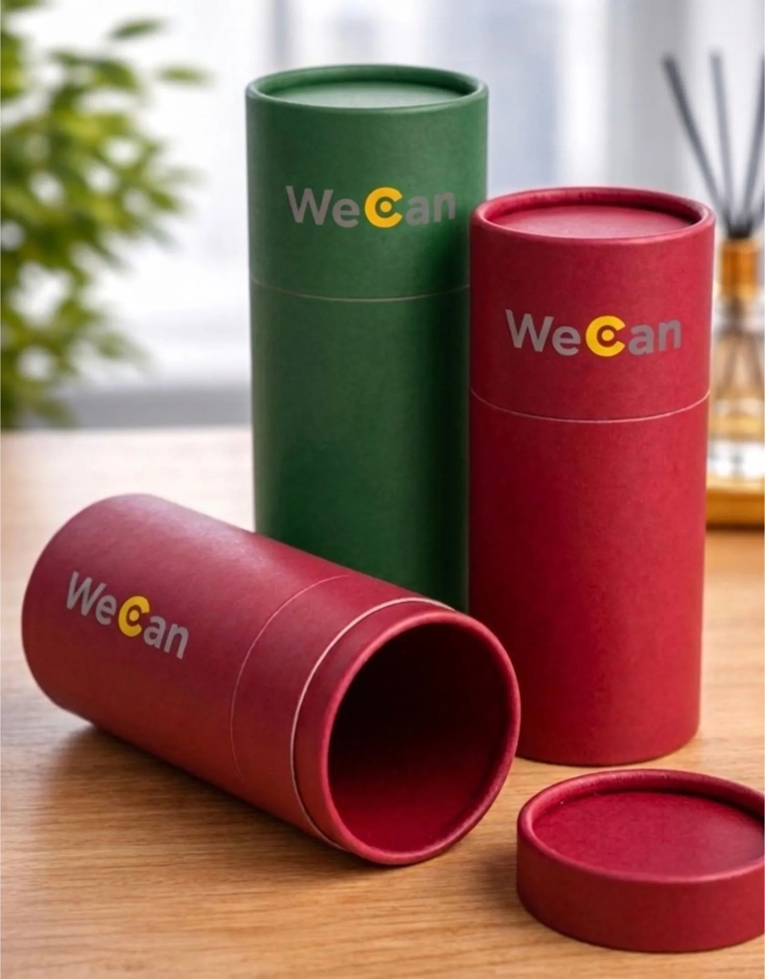 Green and red curling cans with an open lid